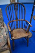 A 19th Century Windsor armchair of narrow proportions