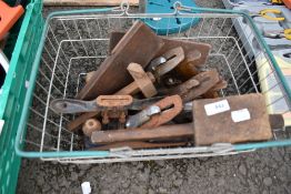 A selection of vintage wood planes etc