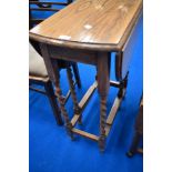 A mid 20th Century oak twist gate leg occasional table