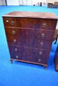 An early to mid 20th Century mahogany bedroom chest of five long drawers, width approx. 77cm