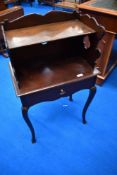 A 19th Century mahogany night stand/bedside pot cupboard having galleried top