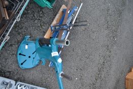 A drill stand and mitre saw