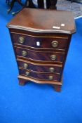 A reproduction Regency dwarf chest of four drawers