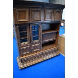 A vintage oak Continental style side cabinet of interesting design