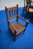 A Victorian mahogany carver chair of small proportions, maybe adapted from child's high or low