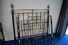 A Victorian cast and brass double bed frame