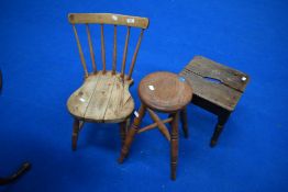 A selection of antique stools and childs chair