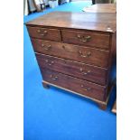 A 19th Century chest of two over three drawers, having brass drop handles and bracket feet, width