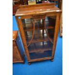 A mid 20th Century oak display cabinet of compact proportions