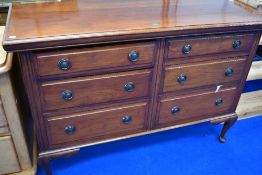 An early 20th Century Regency revival sideboard base having three by three drawers , on cabriole