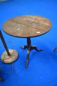 AS 19th Century pedestal table having circular top on turned column and triple splay legs