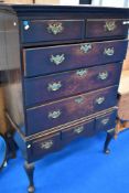 A period oak Chest on stand in the Queen Anne style with brass drop handles and cabriole legs