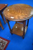 An early 20th Century oak twist leg occasional table