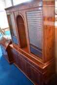 A reproduction Regency style yew wood bookcase/display cabinet