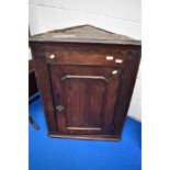 A 19th Century oak corner cupboard