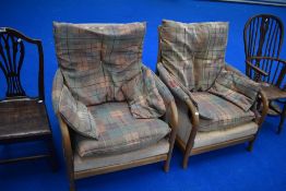 A pair of Cintique easy chairs (af)