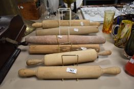 Six vintage and antique primitive wooden rolling pins.