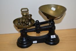 A set of late 19th Century/early 20th Century scales with weights