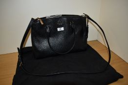 A Kate Spade black leather shoulder bag