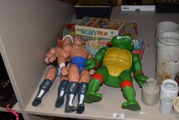 Two 1991 Galloop WCW wrestling figures, Rick Flair and similar, sold with a 1989 Playmates toys