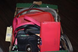 A variety of high quality ladies bags and purses, some new with tags, including Ted Baker, Fiorelli,