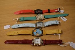 An assorted collection of wristwatches with coloured wrist straps, including Citron and Identity