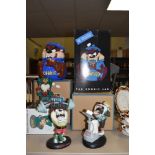 A selection of Warner Bros Taz collectables, including Cookie jar and three figures.