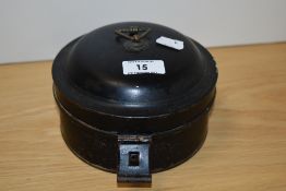 A Georgian toleware spice container, of rounded form, the compartmented interior including a