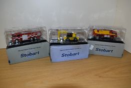 Three Atlas Editions 'World of Stobart' collectable scale models, with boxes and packaging