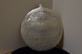 A Victorian mother of pearl carved shell, the scene depicting The Last Supper, 14cm high