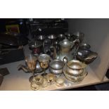 A selection of plated wear and similar, napkin rings, goblets, candlesticks etc to be included.