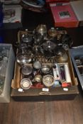 A collection of plated wear, comprising souvenir spoons in boxes, teapots, jug, sugar basin, bud
