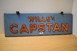 A Wills's Capstan cigarettes advertising sign, the lustre lettering on a blue enamelled ground,