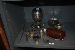 An assorted collection of silver plated ware, to include an egg coddler, a faceted glass preserve