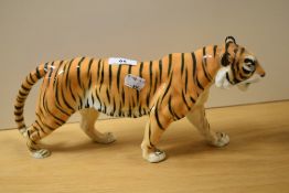 A Karl Ens porcelain tiger ornament, marked to the underside, and measuring 32cm long