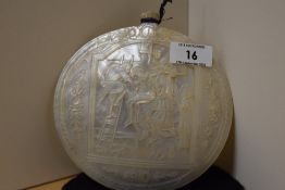 A Victorian mother of pearl carved shell, the scene depicting Christ's descent from the cross,