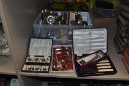 A varied lot of vintage cutlery, including teaspoons in box with colourful coffee bean detail to