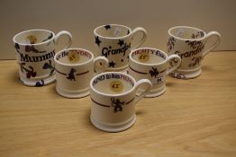 An assorted collection of personalised Emma Bridgewater mugs, Drives A Truck And Mighty Fine, plus