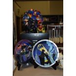 A Trio of Warner Bros Batman three dimensional plaques and two figurines.