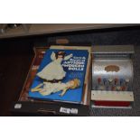 A vintage Codeg toy till and a selection of doll collectors books.