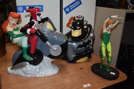 A trio of Warner Bros Batman collectables, including Batman cookie jar, Posion Ivy figurine and
