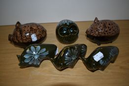 Two mid-late 20th Century glazed ceramic piggy banks, three Lotus pottery bull ornaments, and an