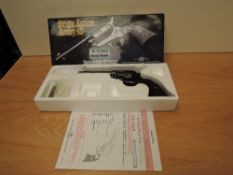 A Japanese Tanaka Colt Single Action Army 45 Air Soft Pistol, BB.177, in card box, purchaser must be