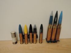 A collection of Deactivated Brass Shells, Riot 1.5' Batton Round, RG MKII x5 one is marked Proof and