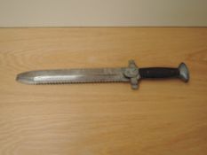 A German WWII Red Cross Hewer having saw back blade, blade length 27cm, overall length 40cm, no