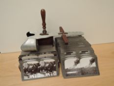 A stereoscopic viewer with 88 Realist Travels The Great War Cards in book style case along with