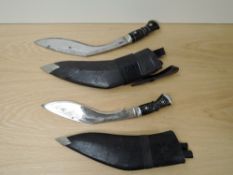 Two Kukri Knifes, one inscribed on blade India, black decorated handle with scabbard with two
