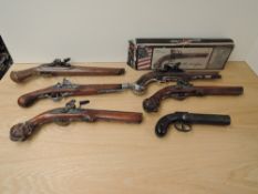 Five reproduction Flintlock Pistols including a George Washington Pistol with box, along with a