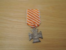 A Dutch Flying Cross (Airmans Cross) in silver, with ribbon, unnamed, front marked INITIATIEF MOED
