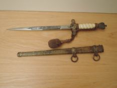 A WWII German Naval Officers Dress Dagger by Eickhorn Solingen, engraved blade, metal scabbard and